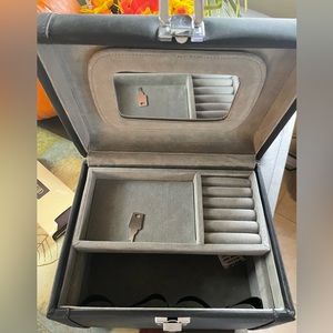 Take-a-long Jewelry/Makeup case with key lock.